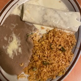 Burrito with queso, fried beans and Spanish rice Burrito with queso, fried beans and Spanish rice