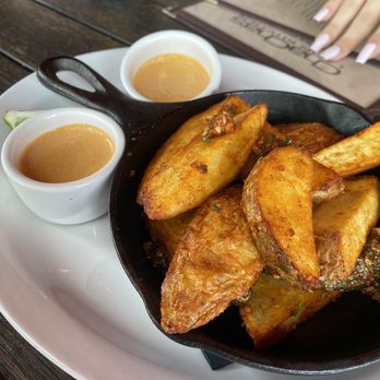 Cha Cha's Latin Kitchen - $9 CHA CHA'S FRIES: Crispy potato's, but the CHIPOTLE AIOLI is to die for! Yum - Bars Near Me - Brea, California