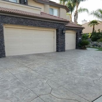 Heritage Bomanite - Concrete driveway and stone veneer installed by Heritage Bomanite. - Flooring Near Me - Fresno, California Heritage Bomanite - Concrete driveway and stone veneer installed by Heritage Bomanite. - Flooring Near Me - Fresno, California