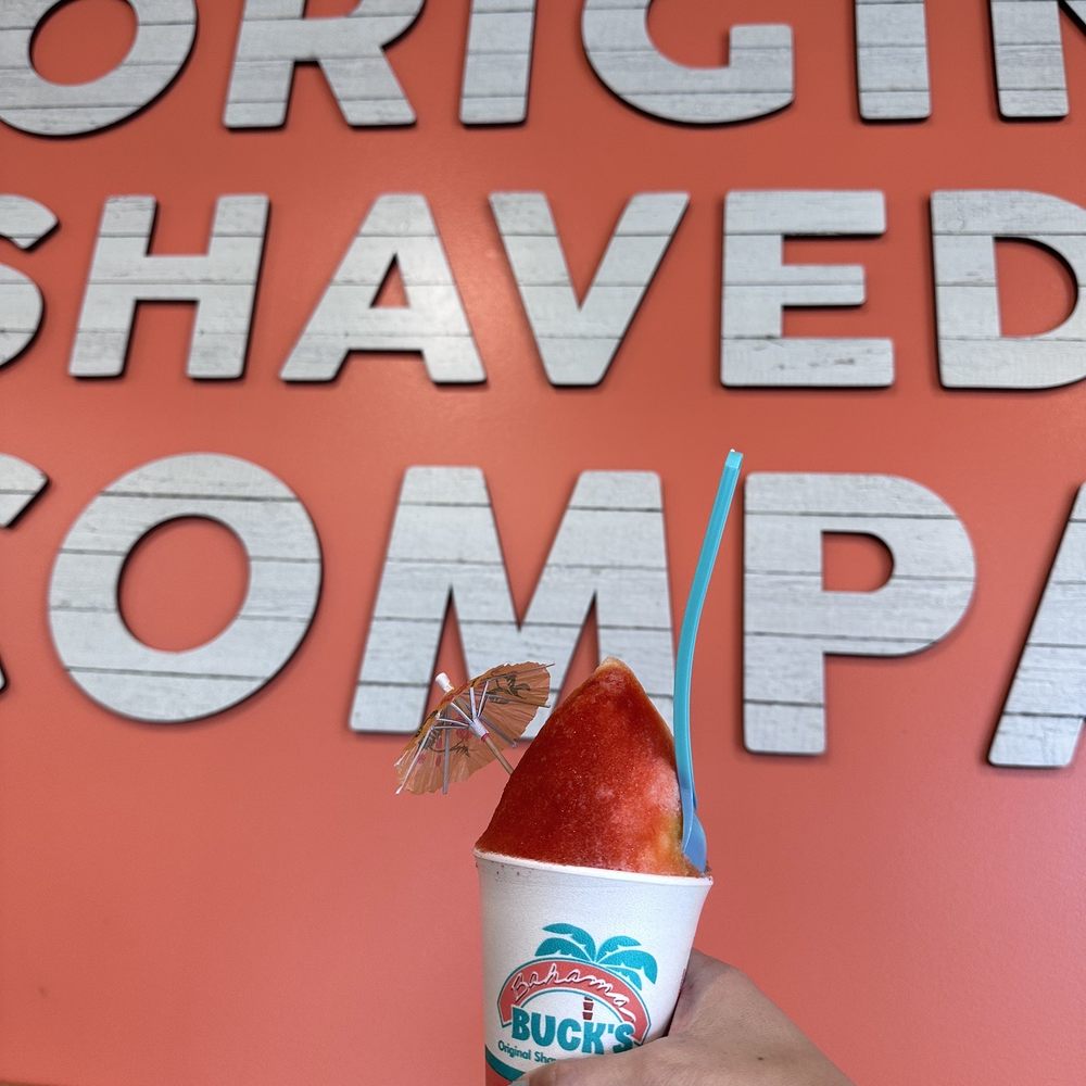 Bahama Buck's - Grand Prairie - a hand holding a cup of ice cream - Juice Bars & Smoothies Near Me - Grand Prairie, Texas Bahama Buck's - Grand Prairie - a hand holding a cup of ice cream - Juice Bars & Smoothies Near Me - Grand Prairie, Texas