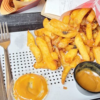 Wurstküche - Groot Fries with Truffle Oil with Thai Peanut and Chipotle Aioli - Hot Dogs Near Me - Los Angeles, California Wurstküche - Groot Fries with Truffle Oil with Thai Peanut and Chipotle Aioli - Hot Dogs Near Me - Los Angeles, California
