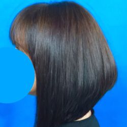 Stacked A Line bob with multi-dimensional Burnett kissed with golds and coppers