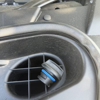 Reliable Chevrolet - Oil cap sitting on top of grille - Car Dealers Near Me - Richardson, Texas Reliable Chevrolet - Oil cap sitting on top of grille - Car Dealers Near Me - Richardson, Texas