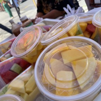 Jesus Hot Dogs - a variety of fresh fruit in plastic containers - Food Trucks Near Me - Los Angeles, California
