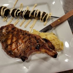 Woodfire Bar & Grille - Pork chop with Brussels in a smoked aoili
