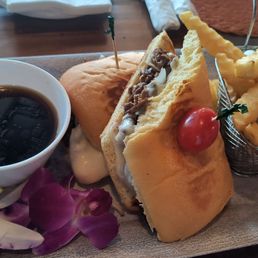 French dip with hot crispy crinkle fries. Very nice plating too. French dip with hot crispy crinkle fries. Very nice plating too.