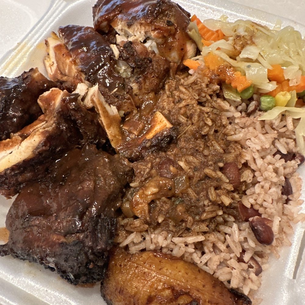 Dumplin Restaurant - Jerk Chicken with oxtail sauce small $12 - Caribbean Near Me - West Palm Beach, Florida
