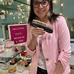 Smiletique - Get a brighter smile guaranteed with our teeth whitening service! Achieve noticeable results in just one visit. Book now and shine bright!