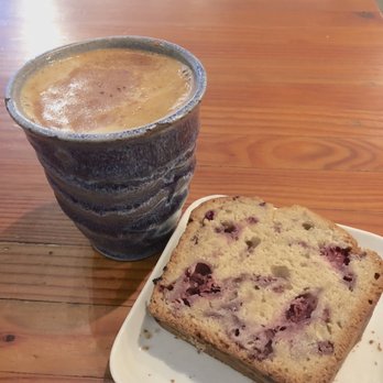 Ghost Note Coffee - Oatnog in a Yutang cup with a slice of cranraspberry bread - Coffee & Tea Near Me - Seattle, Washington Ghost Note Coffee - Oatnog in a Yutang cup with a slice of cranraspberry bread - Coffee & Tea Near Me - Seattle, Washington