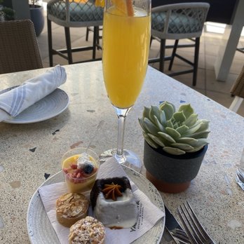 Radiance Cafe - Drinks had to be picked up from the pool bar across the way. Servers did their best to juggle their tables and grab drinks. - Breakfast & Brunch Near Me - S Highland, California Radiance Cafe - Drinks had to be picked up from the pool bar across the way. Servers did their best to juggle their tables and grab drinks. - Breakfast & Brunch Near Me - S Highland, California