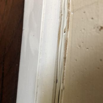 Empire Today - Caulked right over wood dust that the created taking out old floor. Now I cant clean it - Carpet Installation Near Me