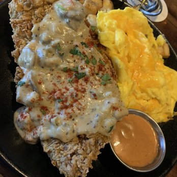 Foxhole Culinary Tavern - Akashi chicken fried steak with patatas bravas and cheesy eggs - New American Near Me - Austin, Texas