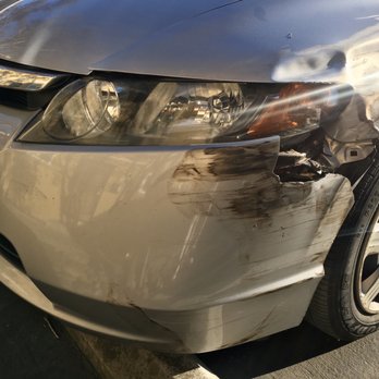 Kim's Auto Body - Before repairs showing major bumper, fender, and headlight damage - Body Shops Near Me - Santa Clara, California
