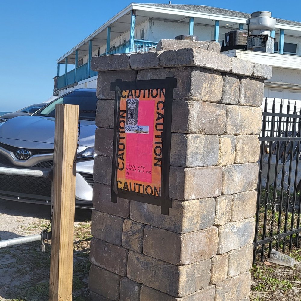 This is what he called his private parking sign. Against a whole different business, This is what he called his private parking sign. Against a whole different business,