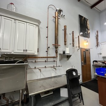 Castle Spirits Distillery - a kitchen with copper pipes and a sink - Distilleries Near Me - Oklahoma City, Oklahoma Castle Spirits Distillery - a kitchen with copper pipes and a sink - Distilleries Near Me - Oklahoma City, Oklahoma