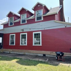 JF Exteriors - Porch removed and siding/facia repaired.