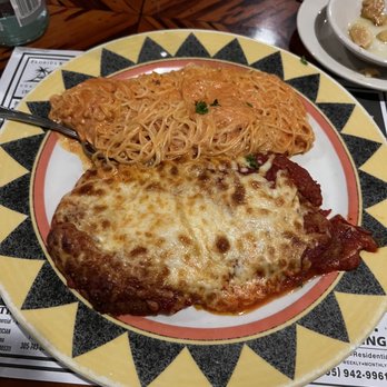 Frank's Grill - Veal Parmesan with angel hair pasta and the house pink sauce - Seafood Near Me - Marathon, Florida Frank's Grill - Veal Parmesan with angel hair pasta and the house pink sauce - Seafood Near Me - Marathon, Florida