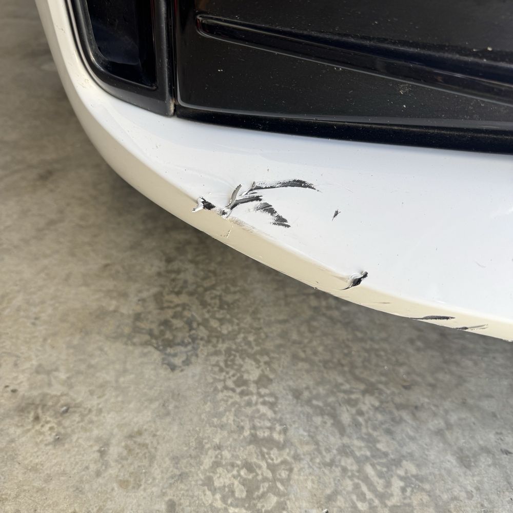 Dings & Dents Gone - Before. Front lower bumper scratches. - Mobile Dent Repair Near Me - stockton, California