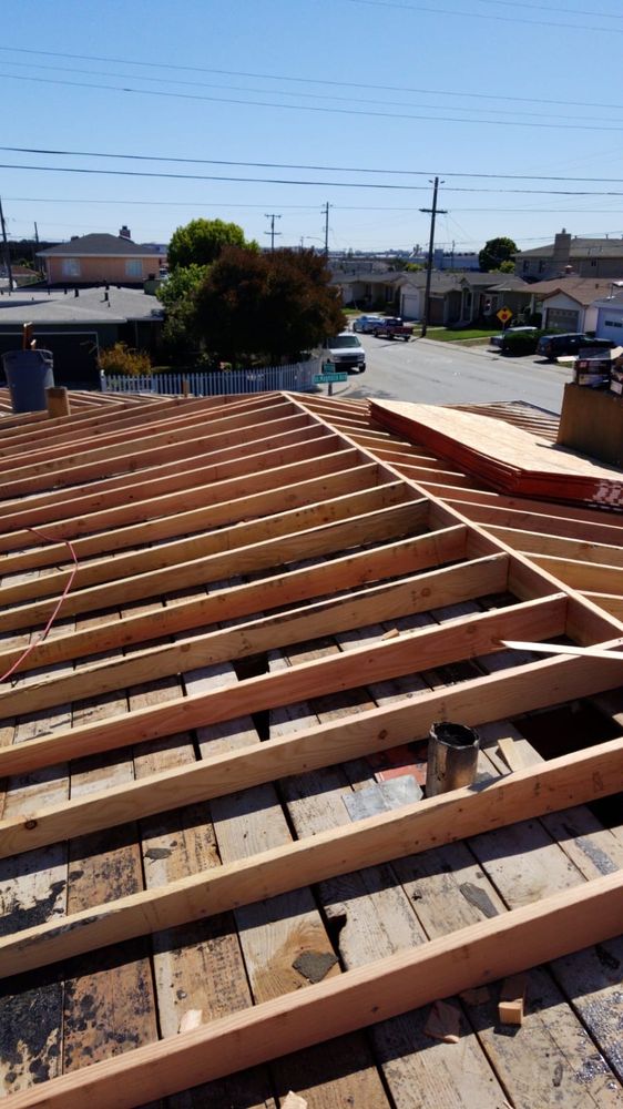 Slide of Caruzo's Roofing Contractors