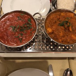 Namaste - The butter chicken (it was very sweet) and the cauliflower curry (right)