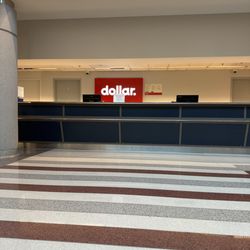 Dollar Car Rental - Rental started at 7am... it's 7:22 and not a soul at the desk