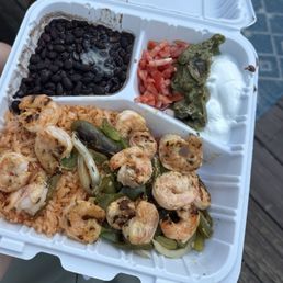 Shrimp fajitas, super dry shrimp, rice was very dry and stale, guac was brown Shrimp fajitas, super dry shrimp, rice was very dry and stale, guac was brown