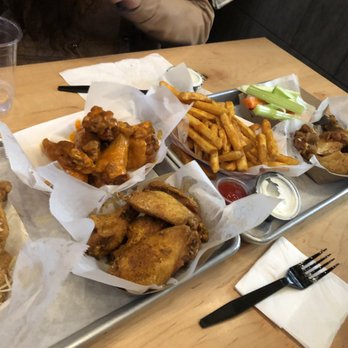 Fire Wings - Garlic parm, buffalo, Louisiana rub, and lemon pepper - Chicken Wings Near Me - San Mateo, California Fire Wings - Garlic parm, buffalo, Louisiana rub, and lemon pepper - Chicken Wings Near Me - San Mateo, California