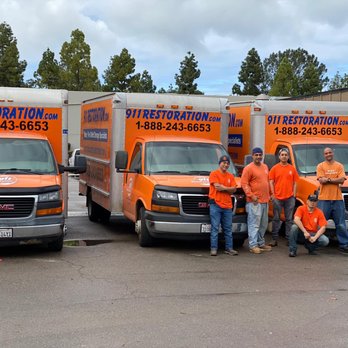 911 Restoration - 911 techs In Front of Trucks - Damage Restoration Near Me - Corona, California 911 Restoration - 911 techs In Front of Trucks - Damage Restoration Near Me - Corona, California