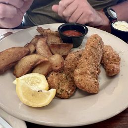 Fish and chip meal. It came with five delicious pieces of fish. We had already ate two prior to the picture. Fish and chip meal. It came with five delicious pieces of fish. We had already ate two prior to the picture.