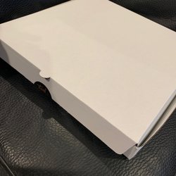 Art & Intelligence - They provide you with a box to take your painting home in.