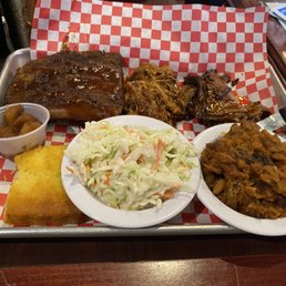Brisket, pulled pork, ribs, coleslaw, pulled pork bbq beans, cornbread and warm cinnamon apples. Brisket, pulled pork, ribs, coleslaw, pulled pork bbq beans, cornbread and warm cinnamon apples.
