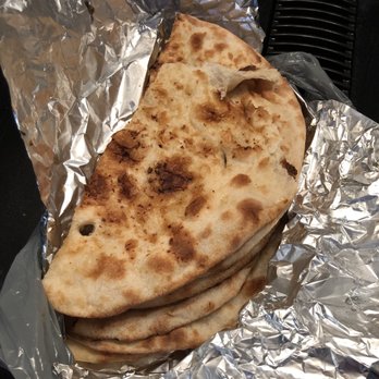 Tandoori Tonite - Garlic naan (garlic is perfect - not burnt) - Indian Near Me - Brampton, Ontario Tandoori Tonite - Garlic naan (garlic is perfect - not burnt) - Indian Near Me - Brampton, Ontario