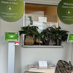 Quest Diagnostics - What used to be a receptionist window, covered by plants and no lights