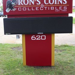 Ron's Coins - Conveniently located right off of I-380 and Center Point Rd NE. Parking is available on both the right and left side of the building.