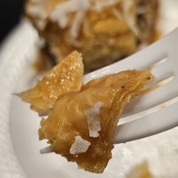 Cello Coffee House & Cafe - Close-up of a fork holding a piece of Baklava. - Coffee & Tea Near Me - Roanoke, Virginia