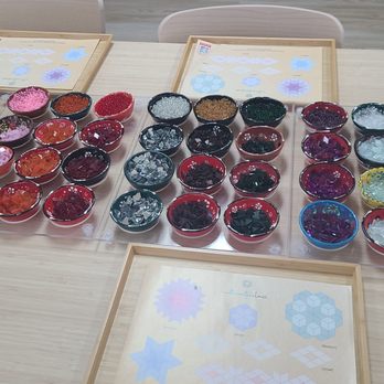 Art Masterclass - Class table with various glass colors to create your masterpiece. - Art Classes Near Me - Carrollton, Texas