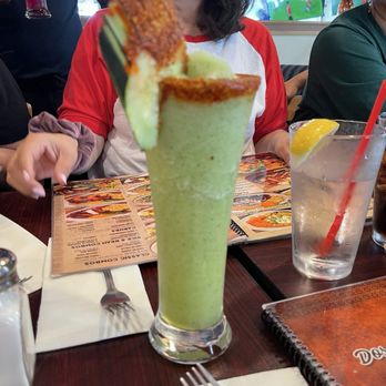 Dos Mundos Kitchen - Virgin Cucumber Mojito - check out of fancy knife skills on the garnish! - Mexican Near Me - Upland, California Dos Mundos Kitchen - Virgin Cucumber Mojito - check out of fancy knife skills on the garnish! - Mexican Near Me - Upland, California