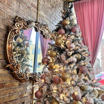 Pink Owl Cafe - a decorated christmas tree in front of a mirror - Coffee & Tea Near Me - Berwyn, Illinois Pink Owl Cafe - a decorated christmas tree in front of a mirror - Coffee & Tea Near Me - Berwyn, Illinois