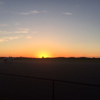The Hangar Bar & Grill - Sunset at the hanger!! - Bars Near Me - Bessemer, Alabama
