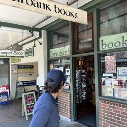 Left Bank Books Collective - Hat he is wearing is an Israel one. This store is owned by ignorant racists