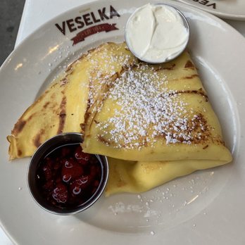 Veselka - Blintzes with fresh raspberry sauce - Ukrainian Near Me - New York, New York Veselka - Blintzes with fresh raspberry sauce - Ukrainian Near Me - New York, New York