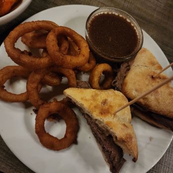 Torches Petaluma - French dip with onion rings - Cocktail Bars Near Me - Petaluma, California Torches Petaluma - French dip with onion rings - Cocktail Bars Near Me - Petaluma, California