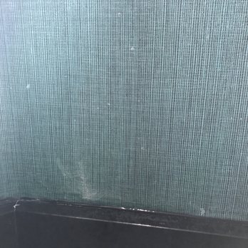 The Whitehall - Not sure what these white spots were all throughout our bathroom walls, but they were there. - Hotels Near Me - Houston, Texas