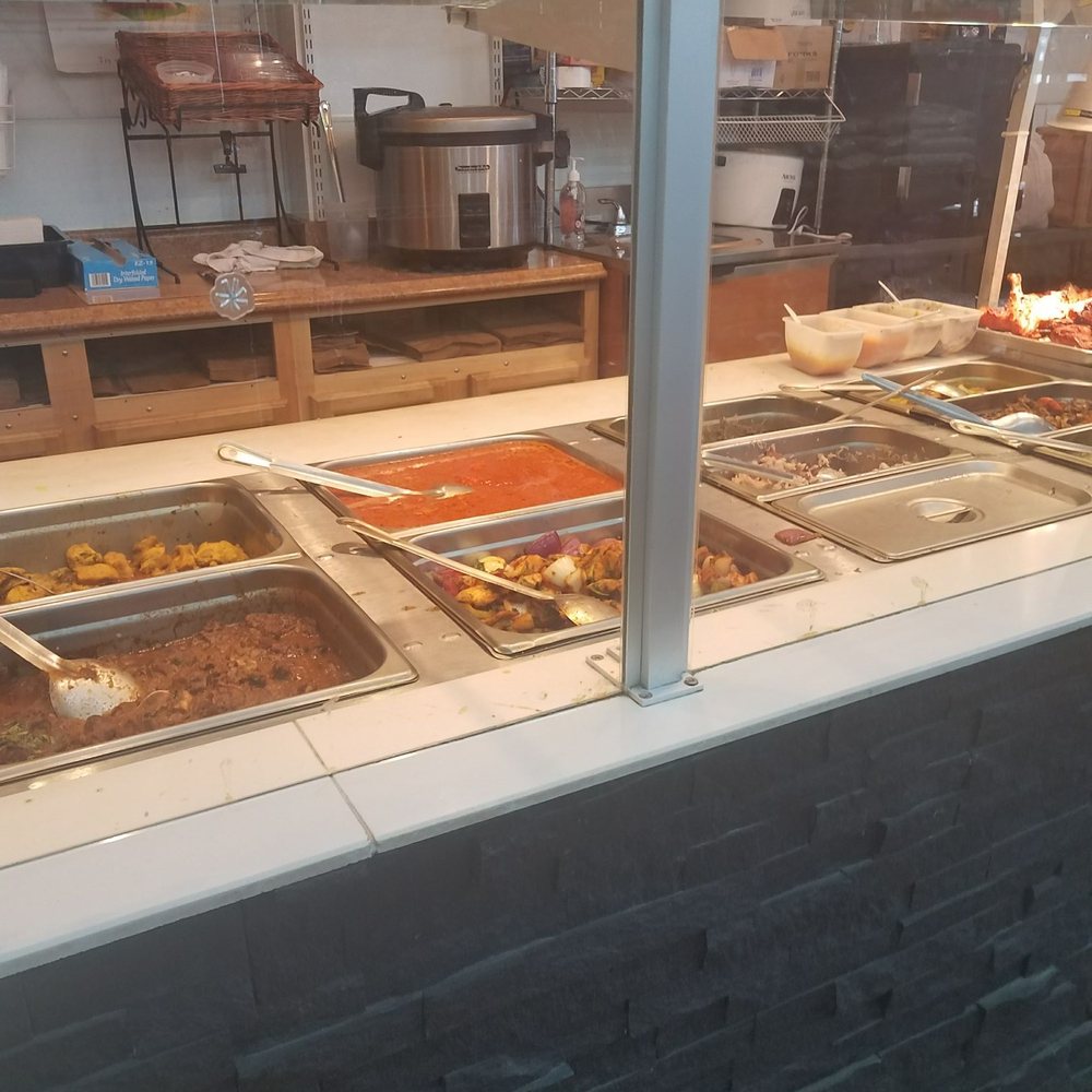 Island Grocery - a variety of food in a buffet - Grocery Near Me - Staten Island, New York Island Grocery - a variety of food in a buffet - Grocery Near Me - Staten Island, New York