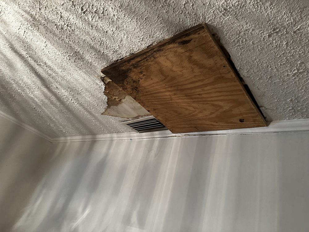 Slide of Gulliver Roofing