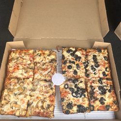 Jet's Pizza - 8 corner square with chicken and 1/2 olive and 1/2 mushrooms.