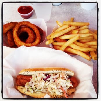 Dogma Grill - Surrounded by my loved ones! Veggie dog, fries & onion rings. - Hot Dogs Near Me - Miami, Florida Dogma Grill - Surrounded by my loved ones! Veggie dog, fries & onion rings. - Hot Dogs Near Me - Miami, Florida