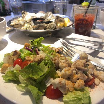 The Oyster Bar - Yum! Crab on a house salad...oysters and a bloody. - Bars Near Me - Stateline, Nevada