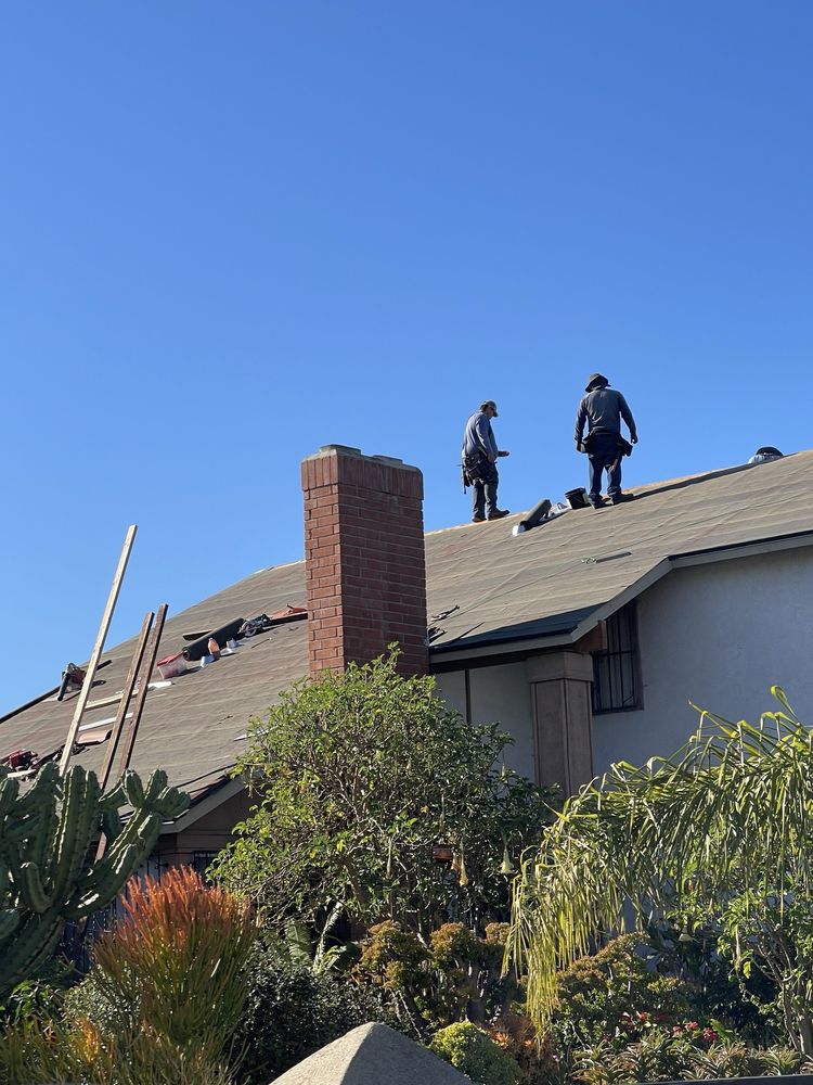 Slide of H Moreno Roofing