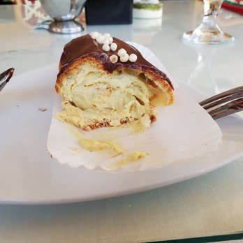 French Corner Cafe - The Chocolate Eclair is really filled with custard! - Bakeries Near Me - Palm Desert, California French Corner Cafe - The Chocolate Eclair is really filled with custard! - Bakeries Near Me - Palm Desert, California